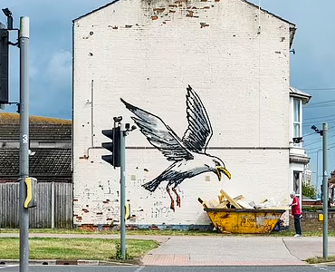 Going, going, gone! Banksy’s skip art gets junked… after passers-by used it to dispose of their litter